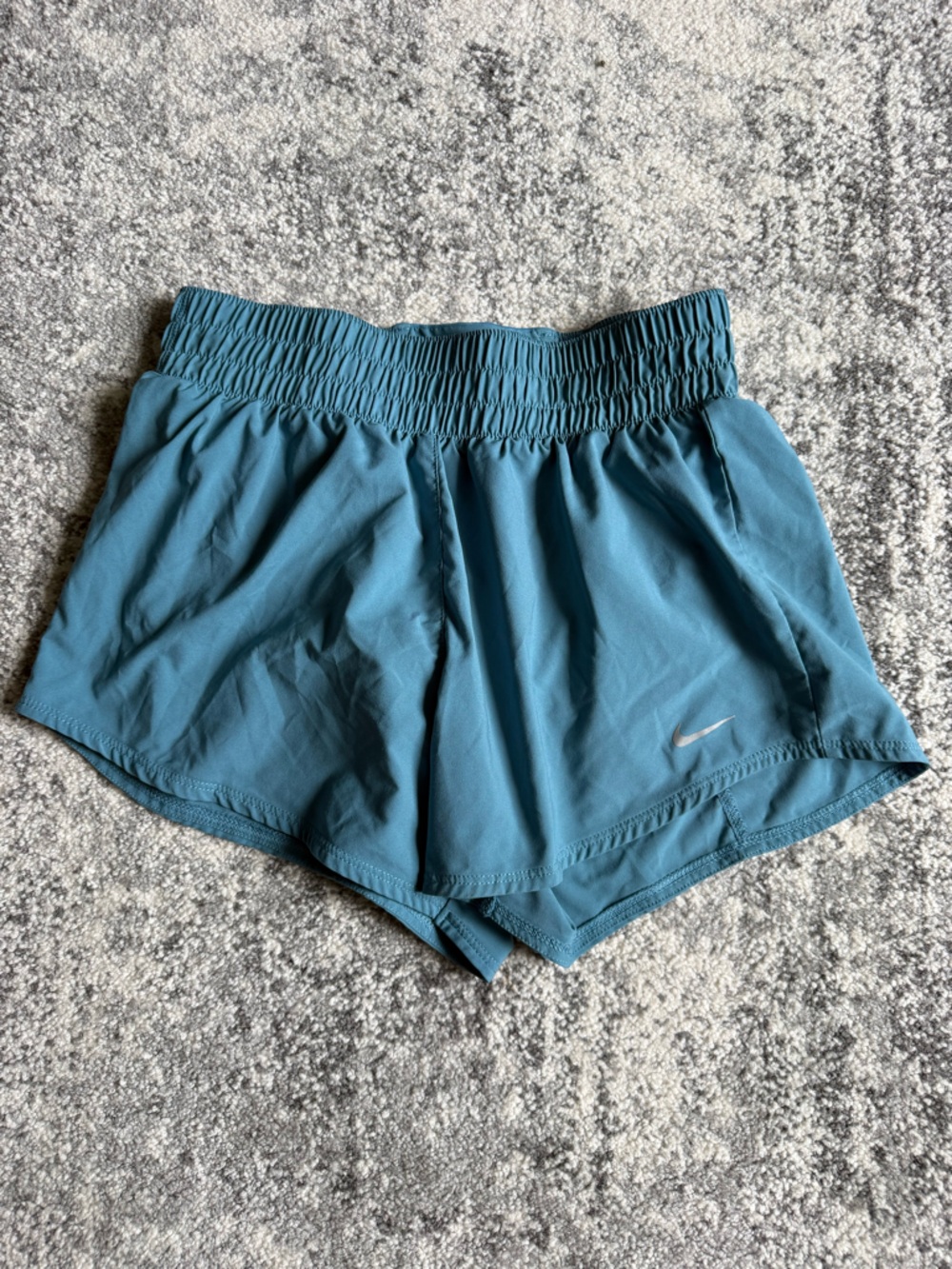 Nike Women's Teal Athletic Shorts with Reflective Swoosh